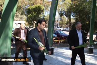 ادای احترام شرکت‌کنندگان در آیین افتتاحیه دوره ارزیابی صلاحیت حرفه‌ای شرکت توزیع نیروی برق استان سمنان به شهید گمنام دانشگاه ملی مهارت استان 9